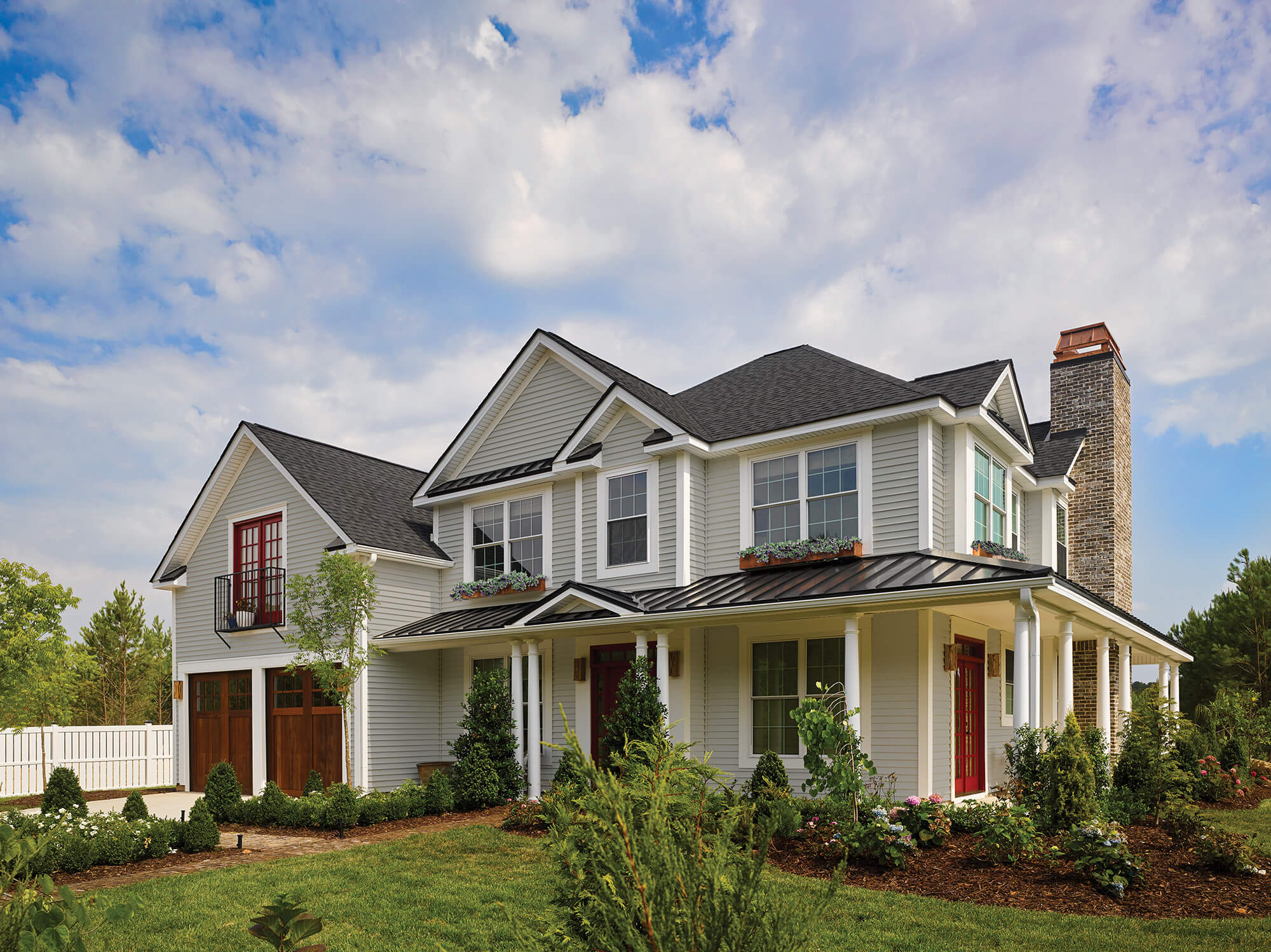 Stock photo from CertainTeed showing off vinyl siding